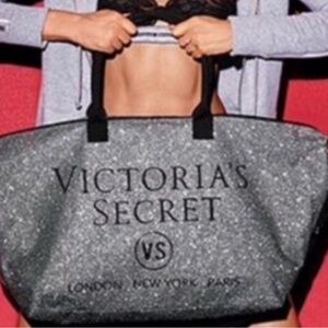 Brand new without Tags Victoria’s Secret Black and Silver Duffle Bag